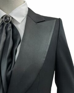 Satin peak lapel and sharp shoulders for formal polish