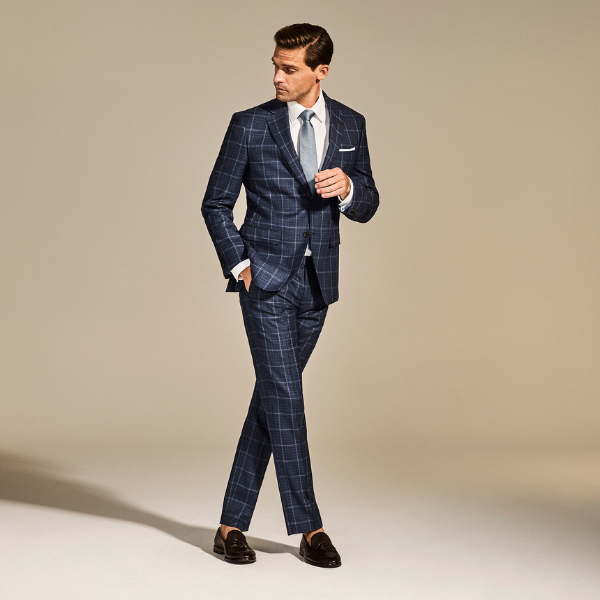 Model wearing a navy check Joe Black suit